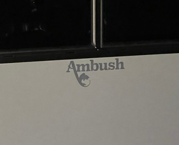 ambush logo on skid house